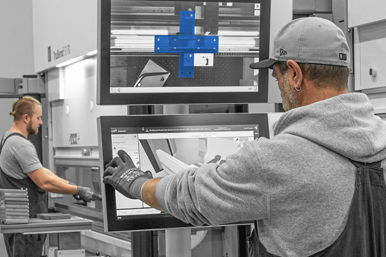 operator programming automated Trumpf metal pressing machine
